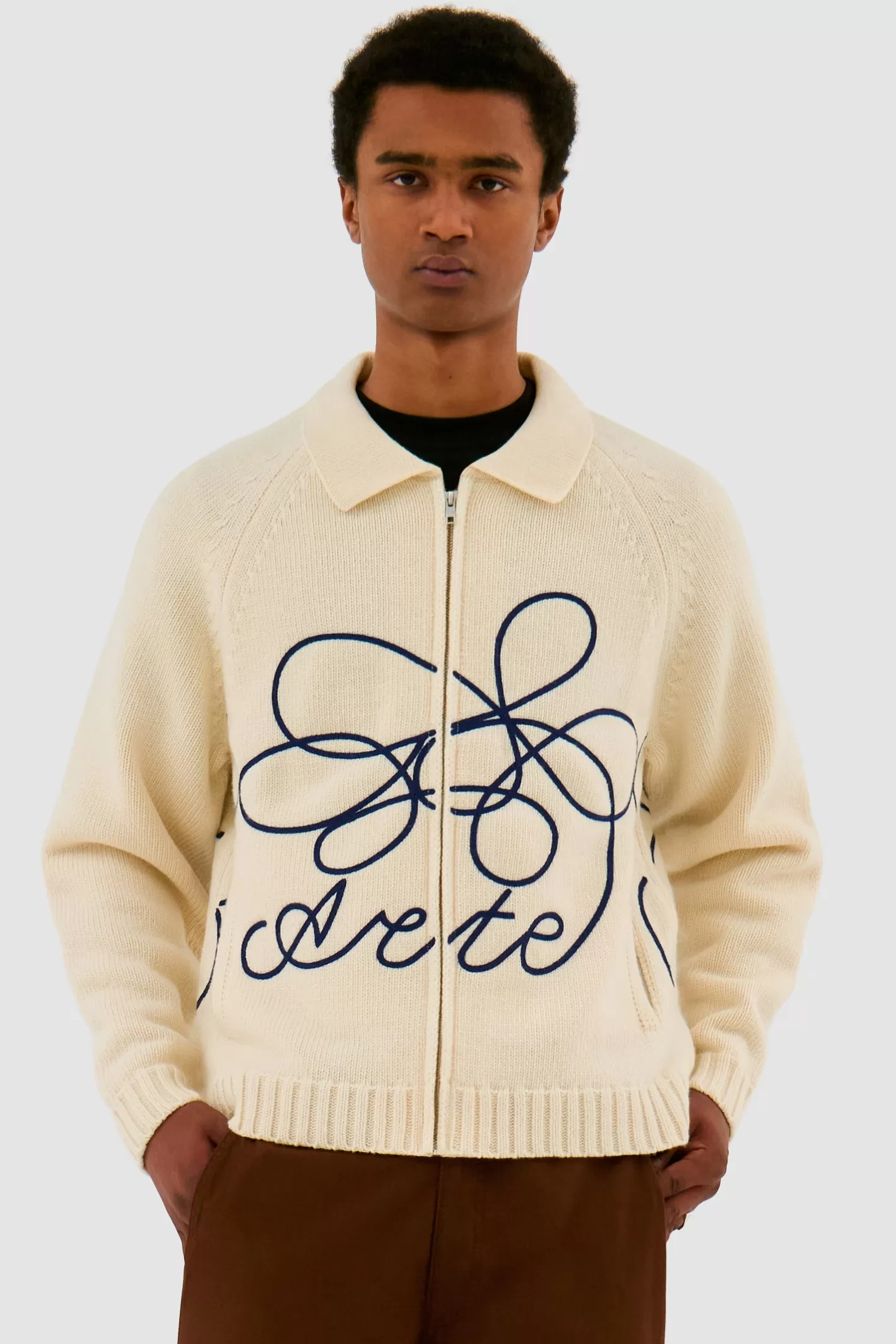 Outlet Tricot avec logo fleuri - Mailles | Sweaters